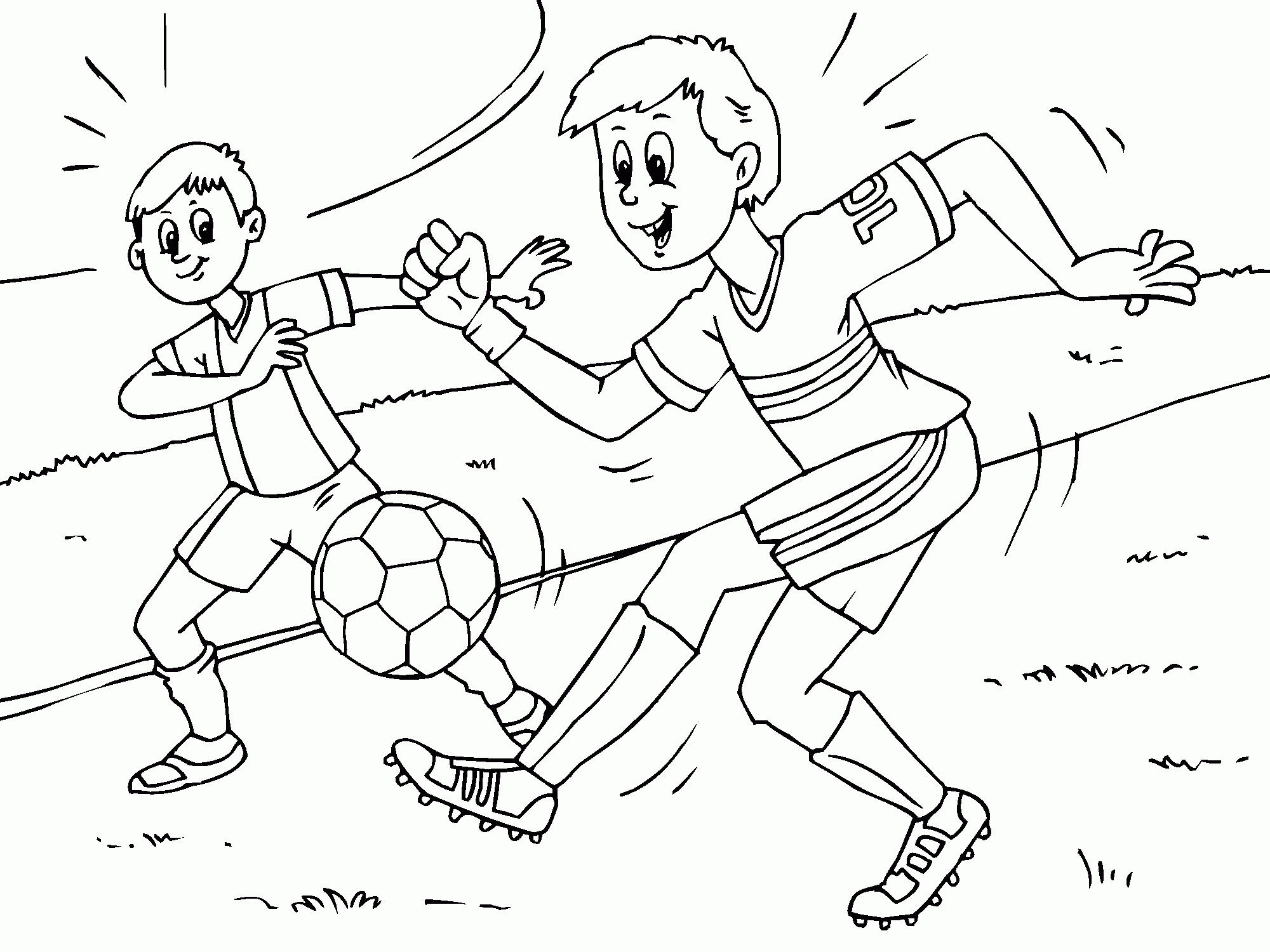 Children playing football in the summer