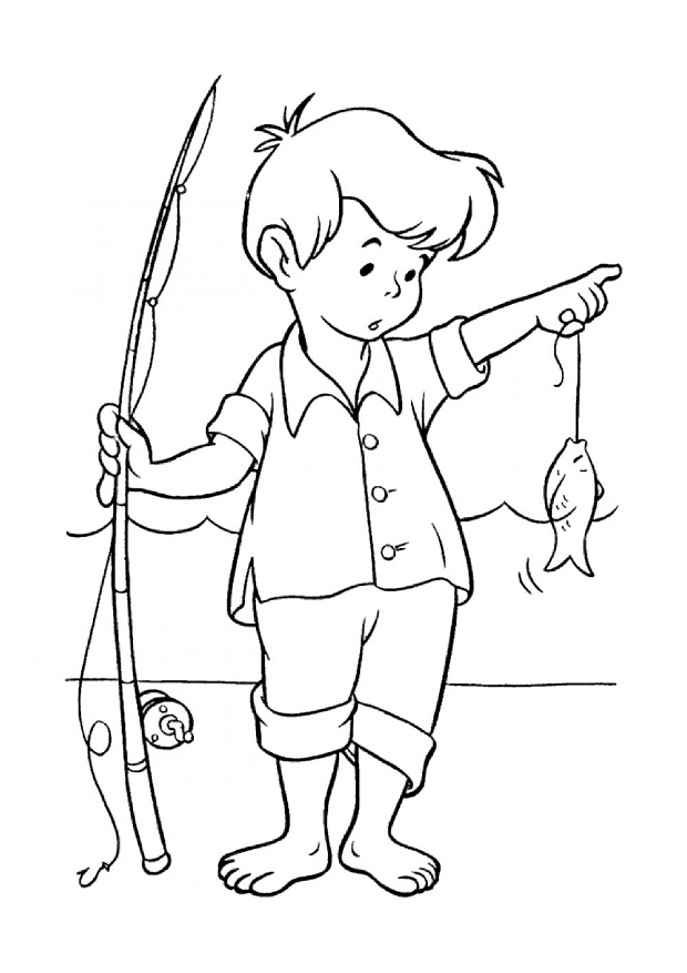 Small
  boy caught a fish with a fishing rod 